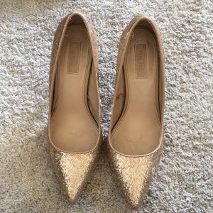 Gold glitter high heels